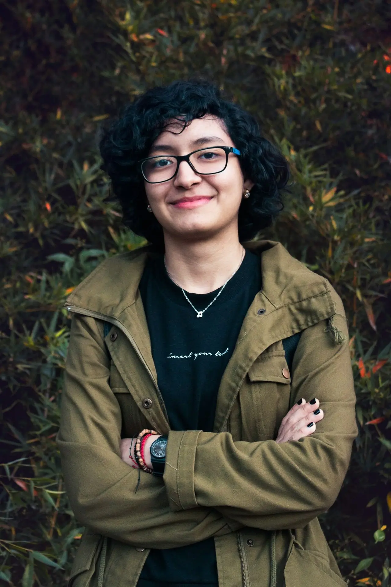 man in brown leather jacket smiling